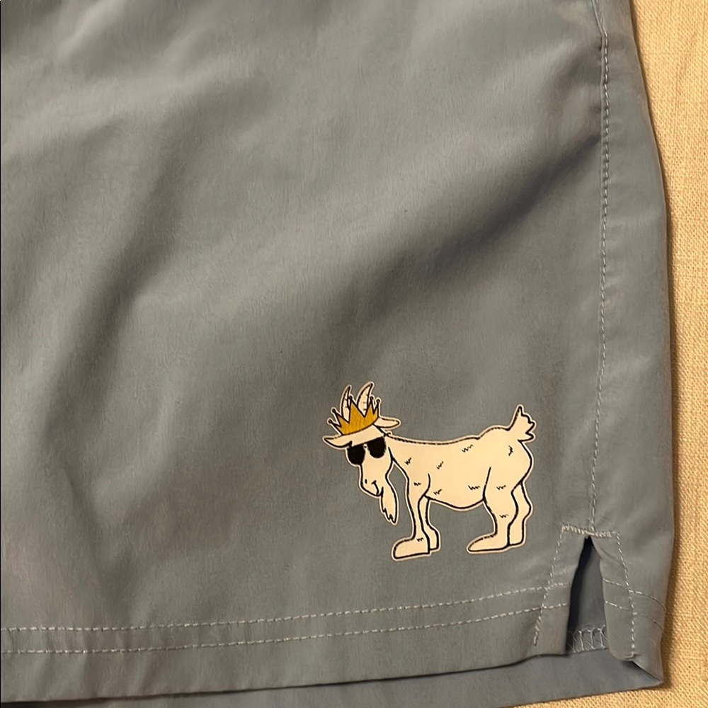 GOAT light blue youth M shorts